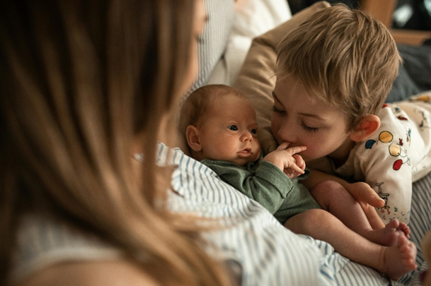 "Parenting two kids under two, managing a toddler and infant together"