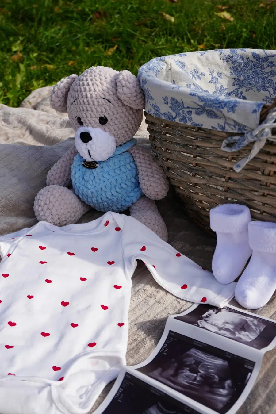 Walmart Baby Registry Welcome Box with baby products like wipes, bottles, and lotions on a white table