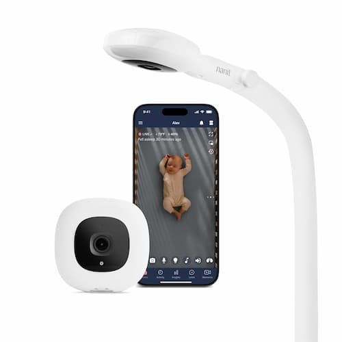 Nanit Pro smart baby monitor camera with an overhead floor stand showcasing live smartphone app tracking of a sleeping infant.