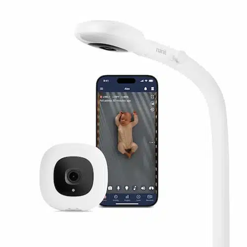 Nanit Pro smart baby monitor camera with an overhead floor stand showcasing live smartphone app tracking of a sleeping infant.